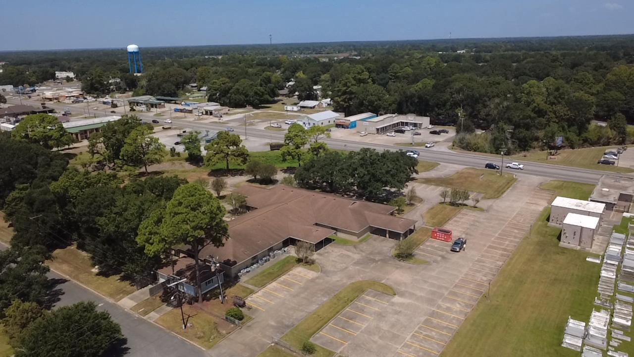 Aerial view of a funeral home in Eunice, LA with newly striped parking rows